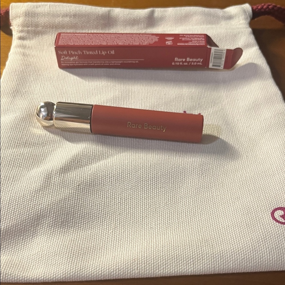 Rare Beauty Delight Lip Oil in Warm Coral